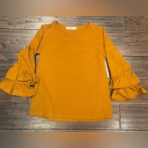 Girls yellow shirt with cute ruffle sleeves